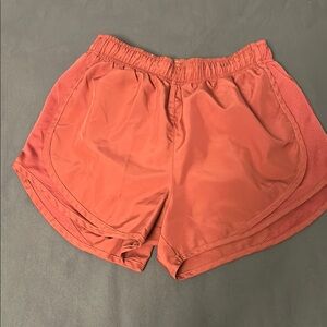 Nike Women's Athletic Shorts in Rust
